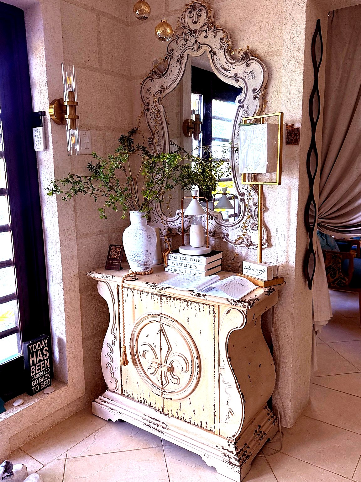 Console and mirror detail at Hidden Gem