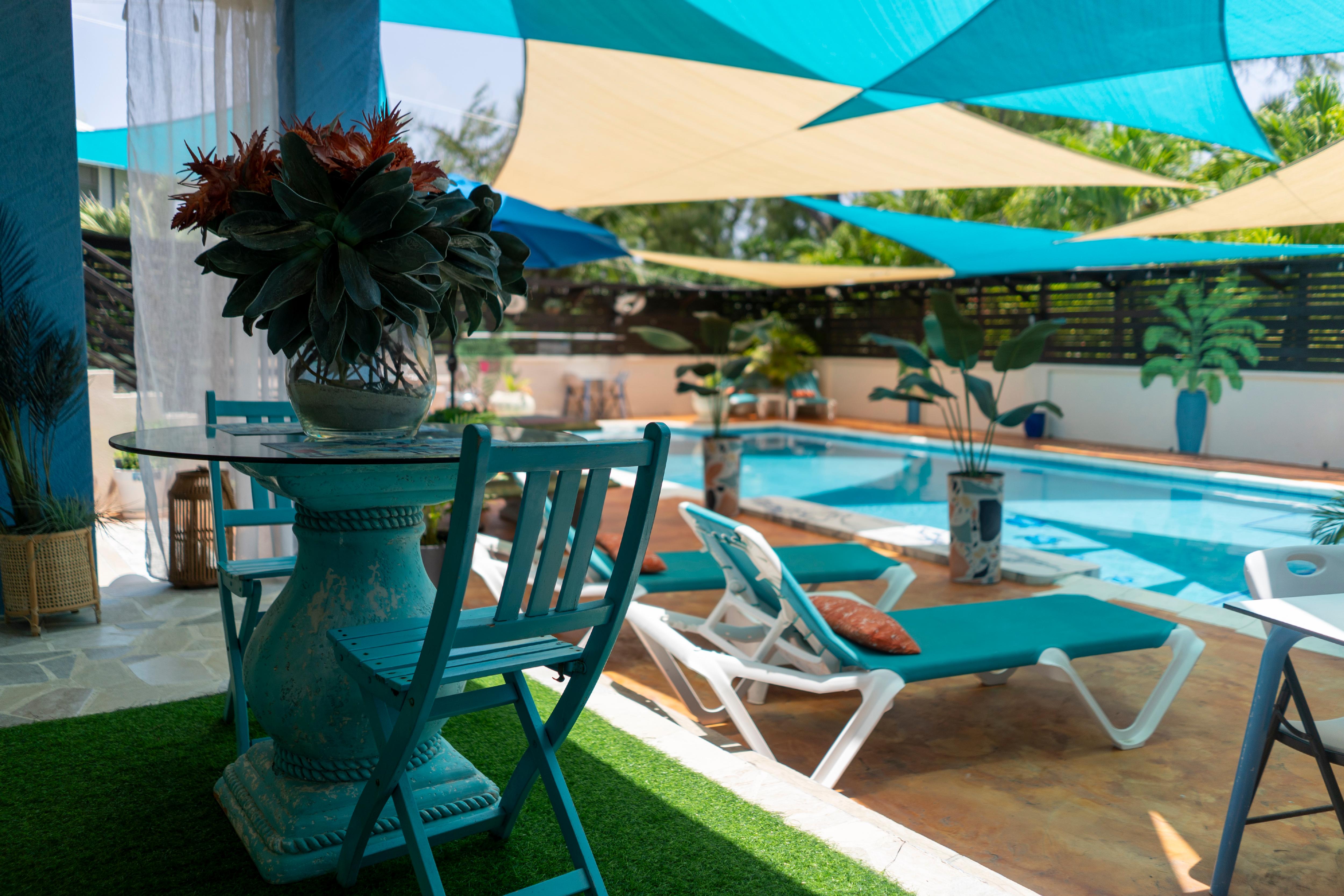 Poolside patio at Hidden Gem, a beautiful escape close to home
