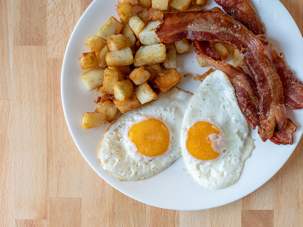 A cooked breakfast of eggs, bacon and potatoes served at The Patio Bar & Bites