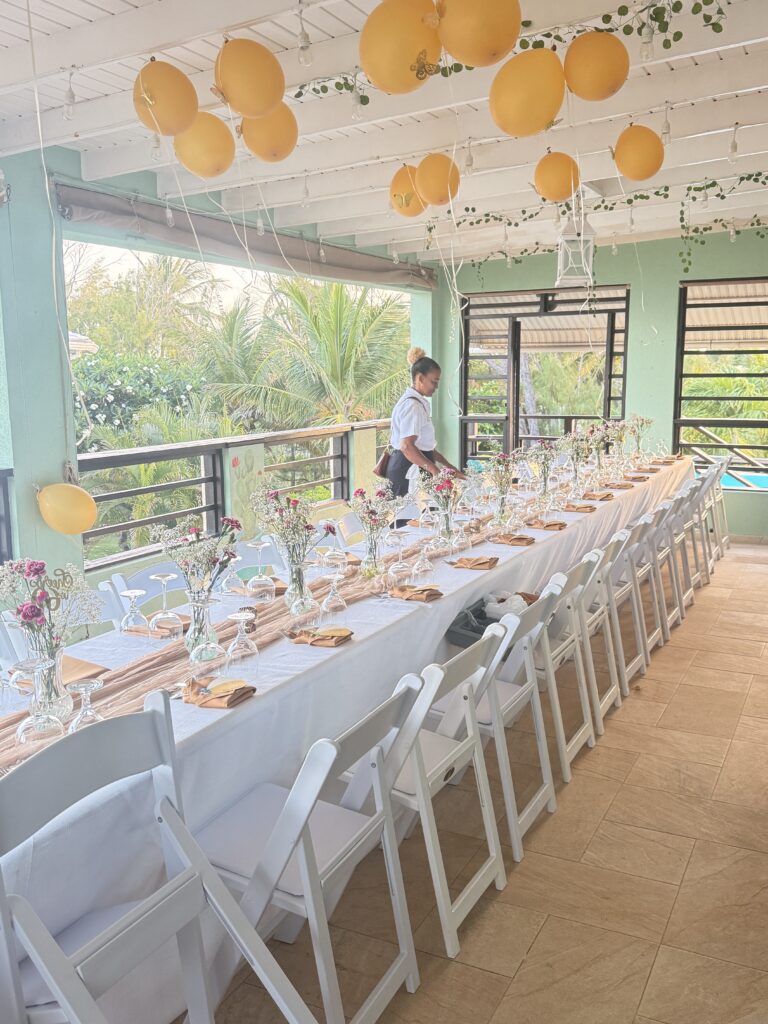 A long table set on the covered terrace for a private group at Hidden Gem Barbados