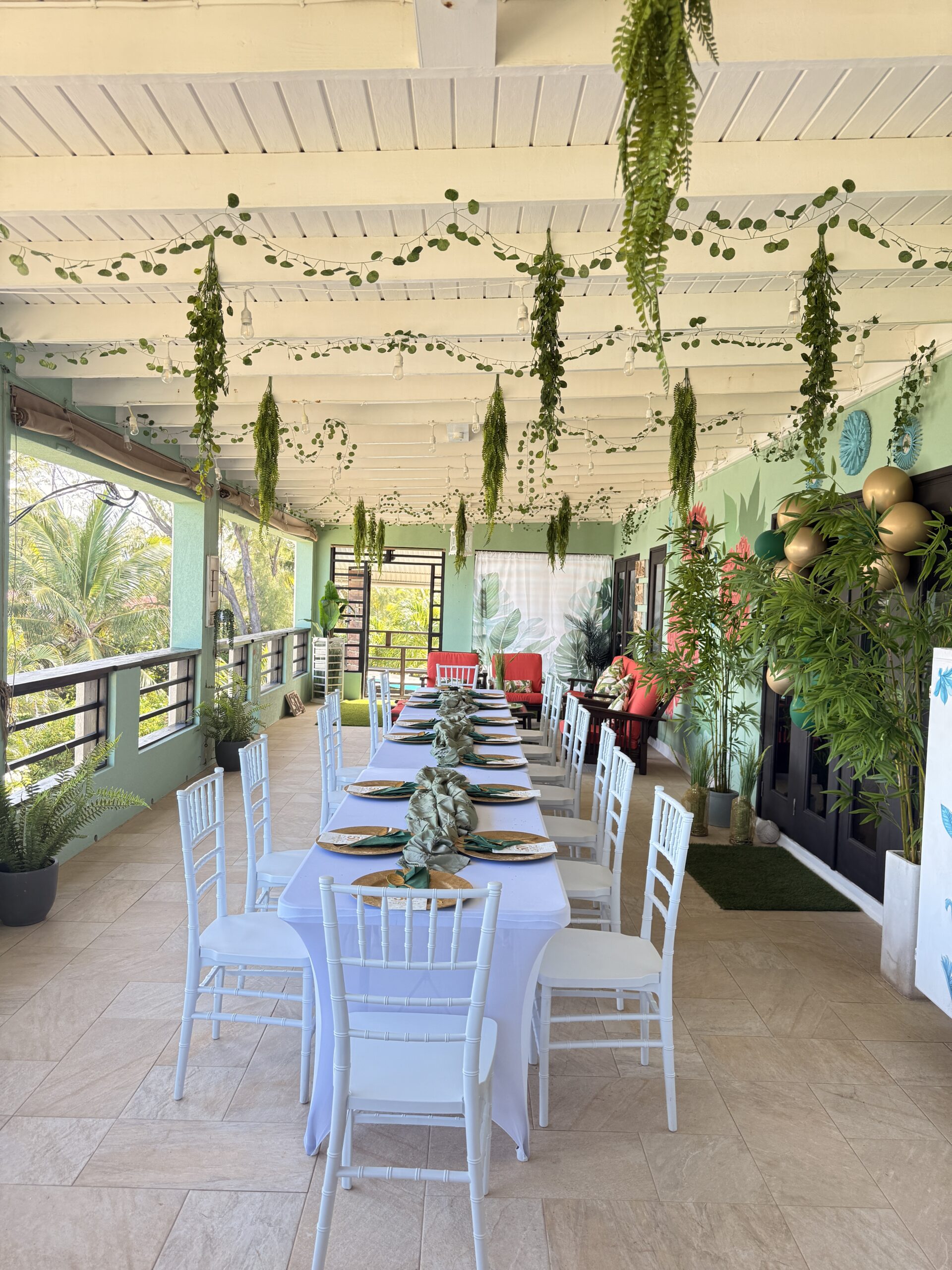 An elegant candlelit dinner table set for a celebration at The Patio