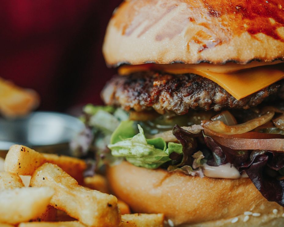 Gourmet burger and fries served for Lunch and Dinner at Hidden Gem